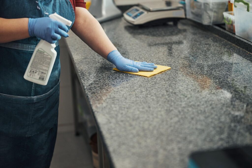 Worker Clean the Tile with Cloth in Holden
