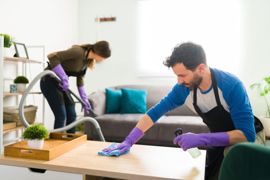 Workers Cleaning Living Room in Southborough
