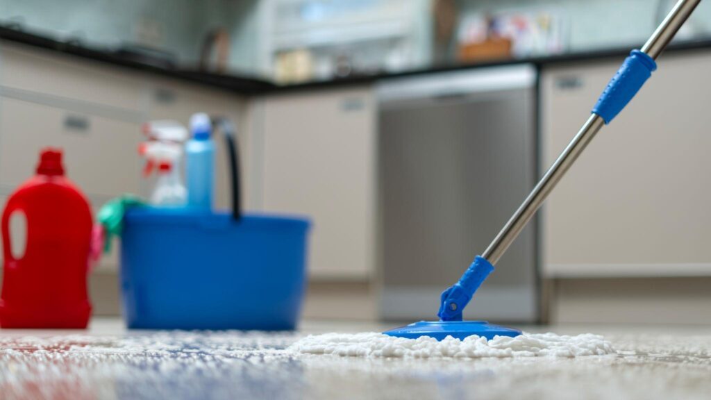 Clean kitchen floor with moop in Ashland